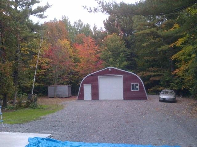 Alpine garage with custom red endwall