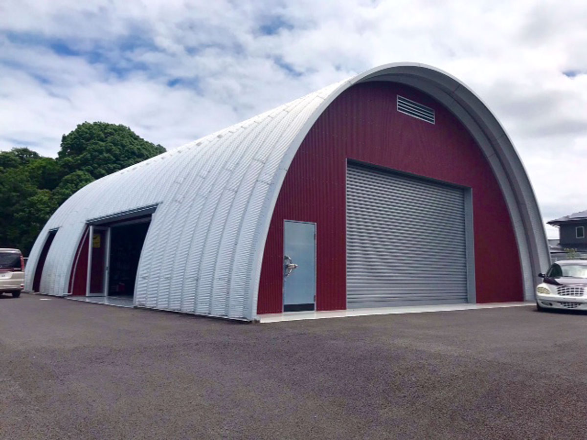 Tall arch building with side door