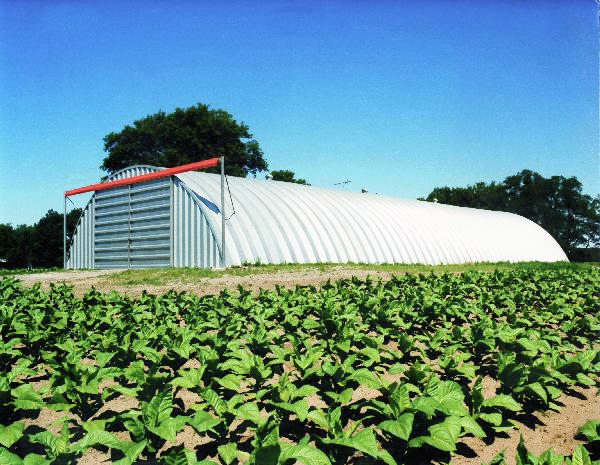 Large arch building in the field