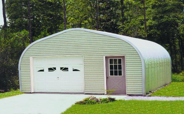 Econospan garage next to a forest