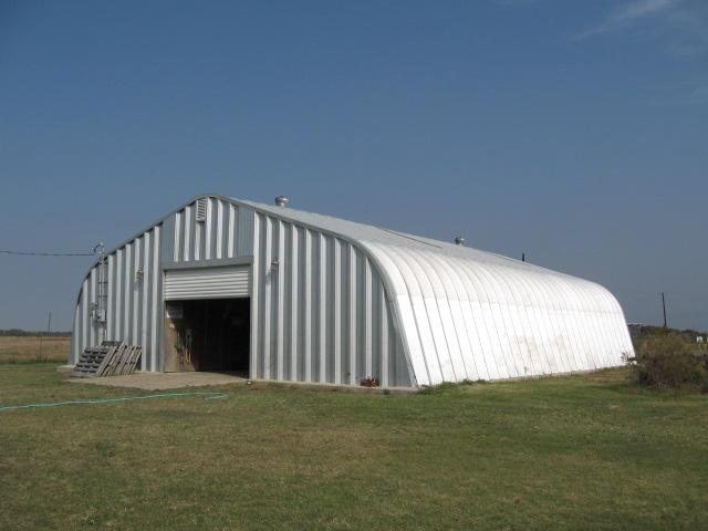 Alpine building in the field with Pioneer front endwall