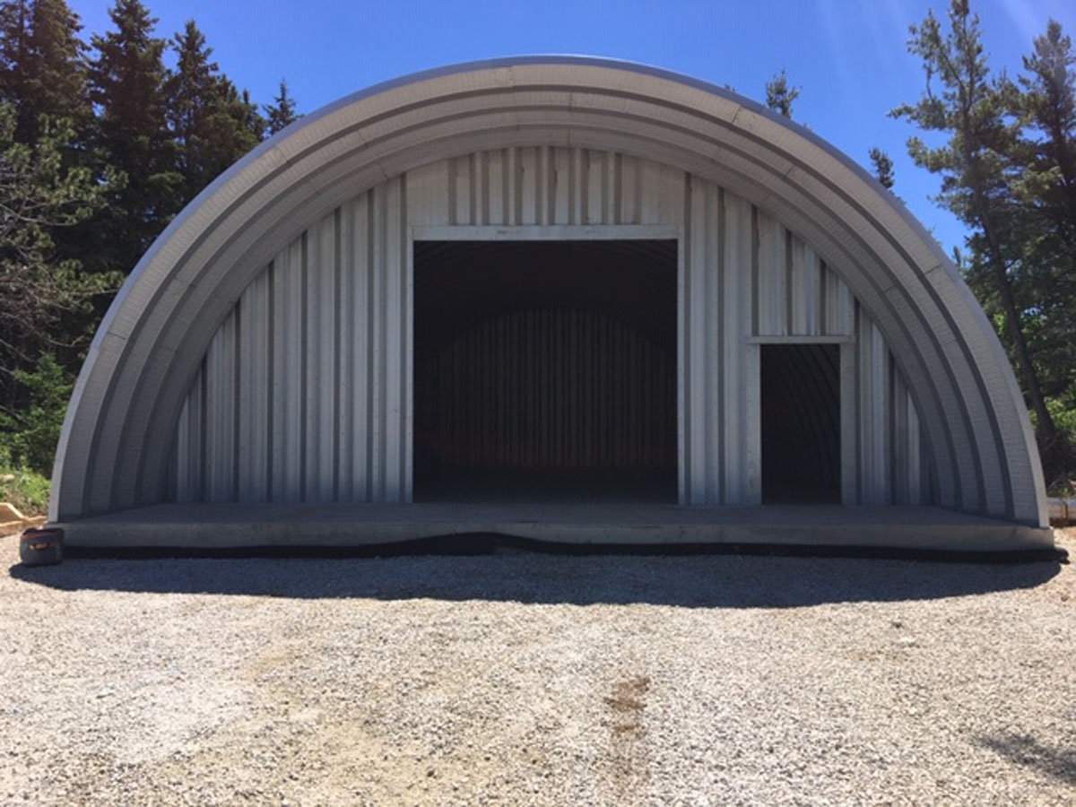 Arch building with extra arch overhang
