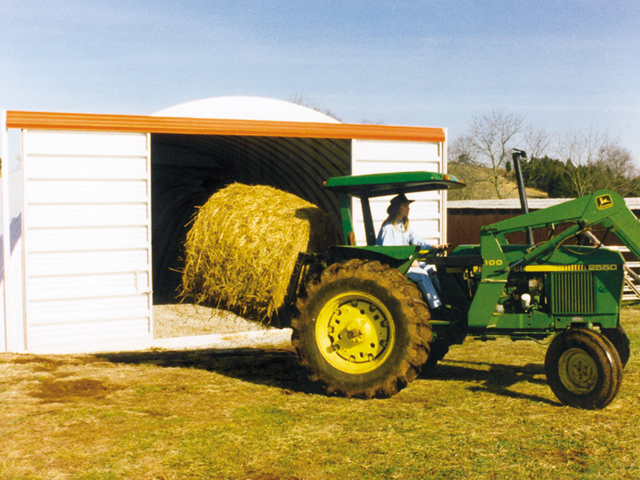 Arch with sliding doors and hay tractor