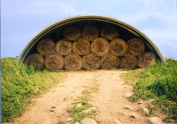 Arch building for hay storage