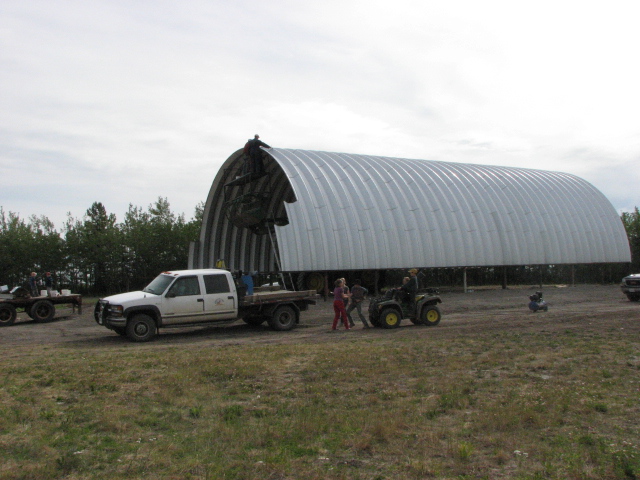 Elevated arch building construction