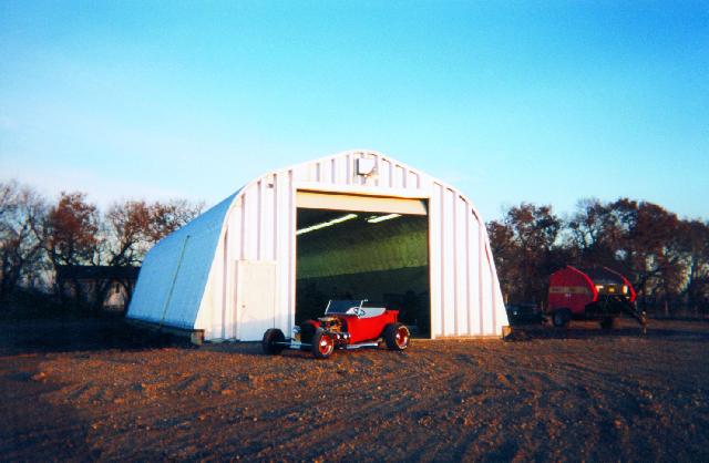 Alpine building with classic car