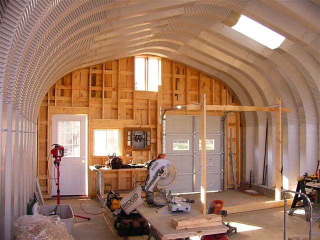 Econospan workshop construction with custom wood front endwall
