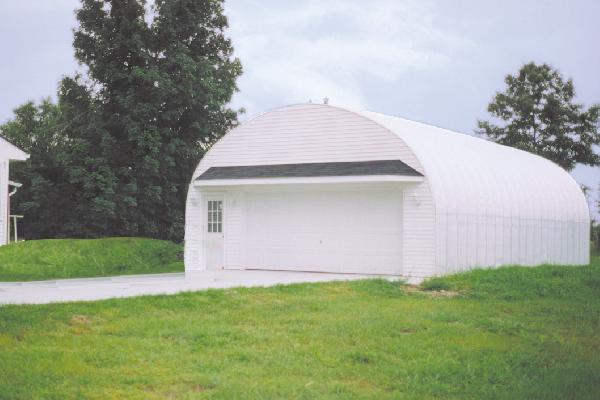 White S-Series garage with custom front and black roof detail