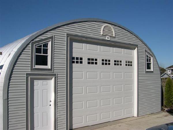 Grey custom front wall S-Series building with specialty windows