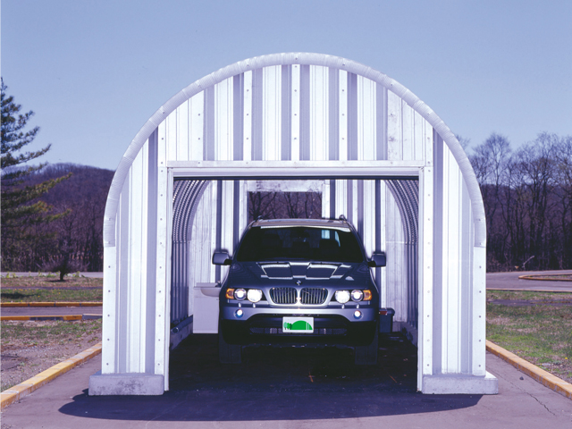 Mini building garage interior with vehicle