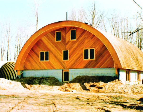 Arch building with wood facing