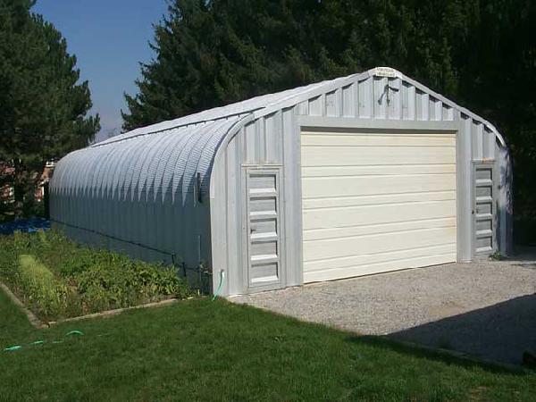 S-Series garage with two man doors and overhead door